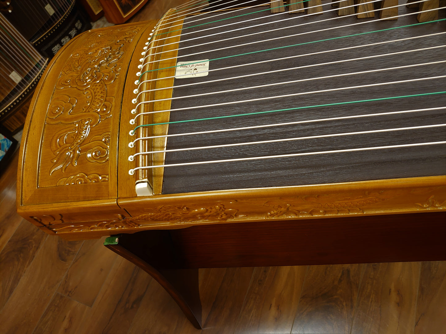 Sound of China Golden-Thread Nanmu Guzheng with Dragon Carving "Nine Dragon Playing Pearls" 唐韵牌演奏级金丝楠木龙雕筝