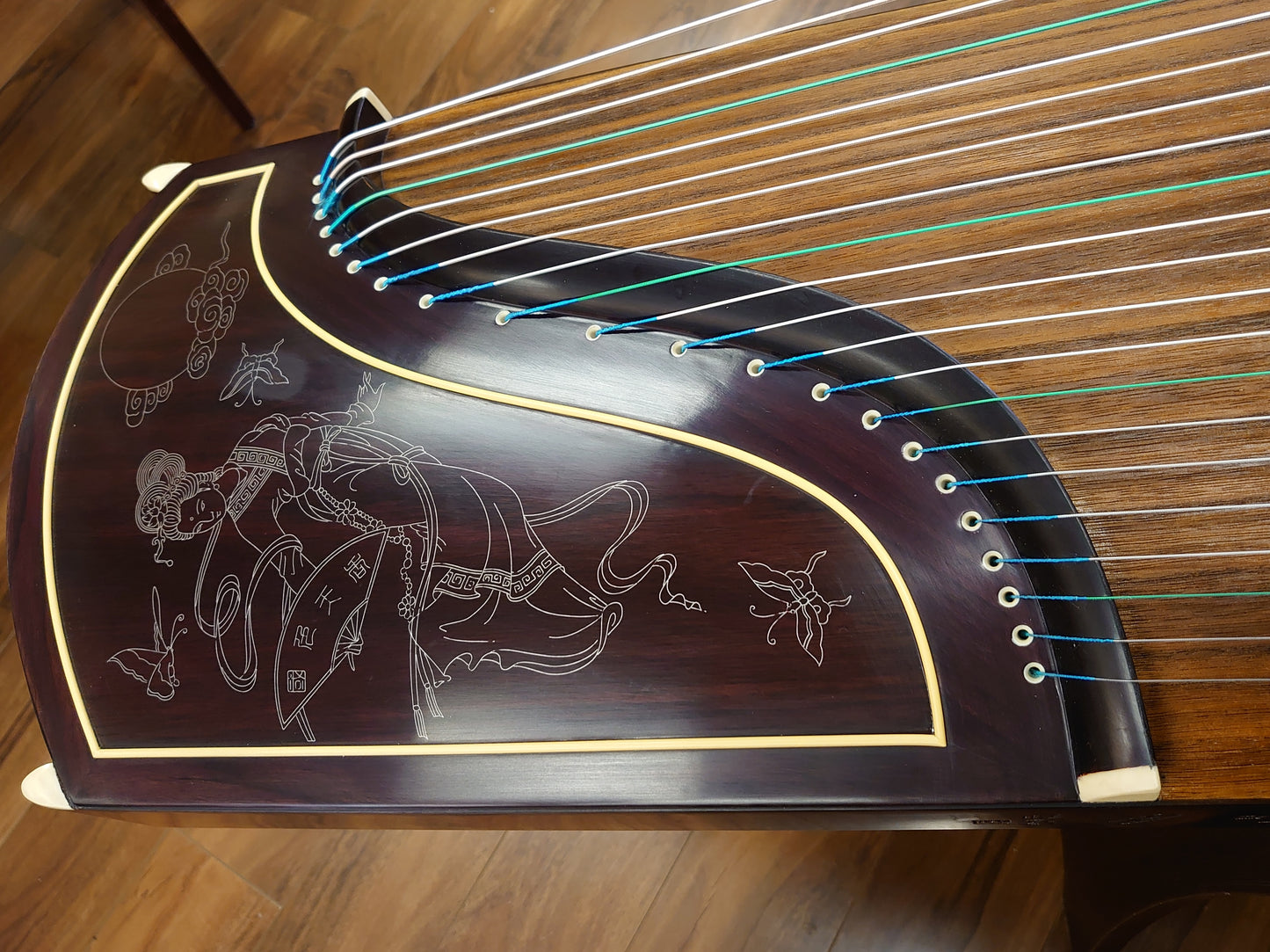 Dunhuang Indian Rosewood 698J Guzheng "Lady Baocai Chasing Butterflies"